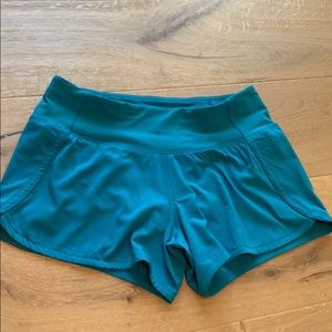 Lululemon teal speed up shorts.